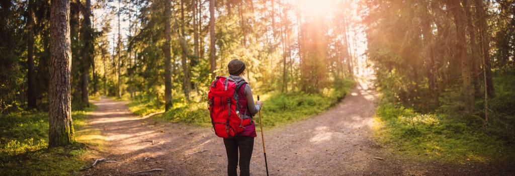 Woman hiking and going camping in nature Eight by Eight